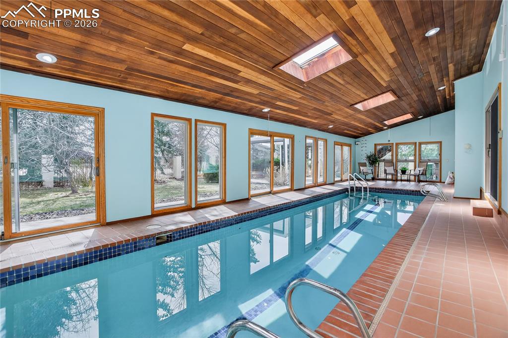 Skylights, seating area, & walk-outs to backyard