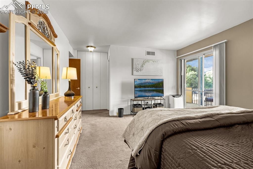 Primary bedroom has ensuite bathroom and large closet (medical unit by door to be removed for easy access to patio)