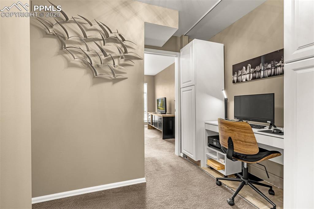 Strategic space for a desk/office (cabinets and desk are free-standing and not included)