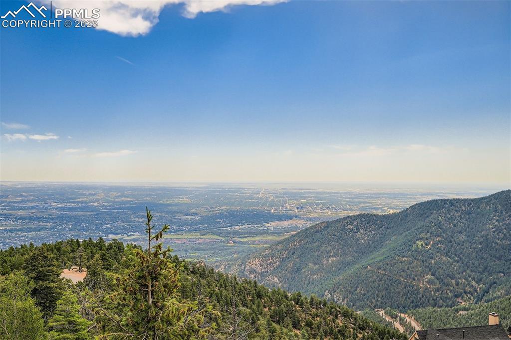 View of mountains, valleys and Colorado Springs from deck