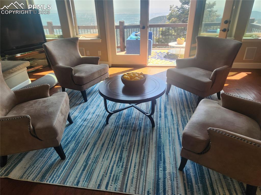 Living area with wood finished floors