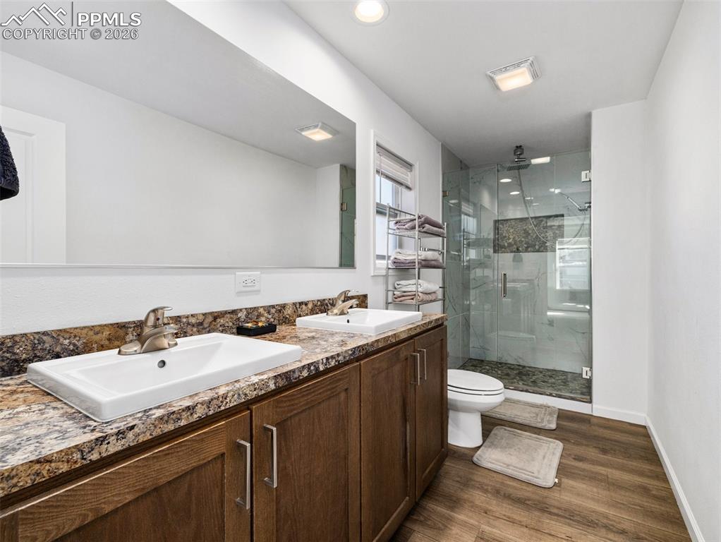 Double vanity with custom tile shower