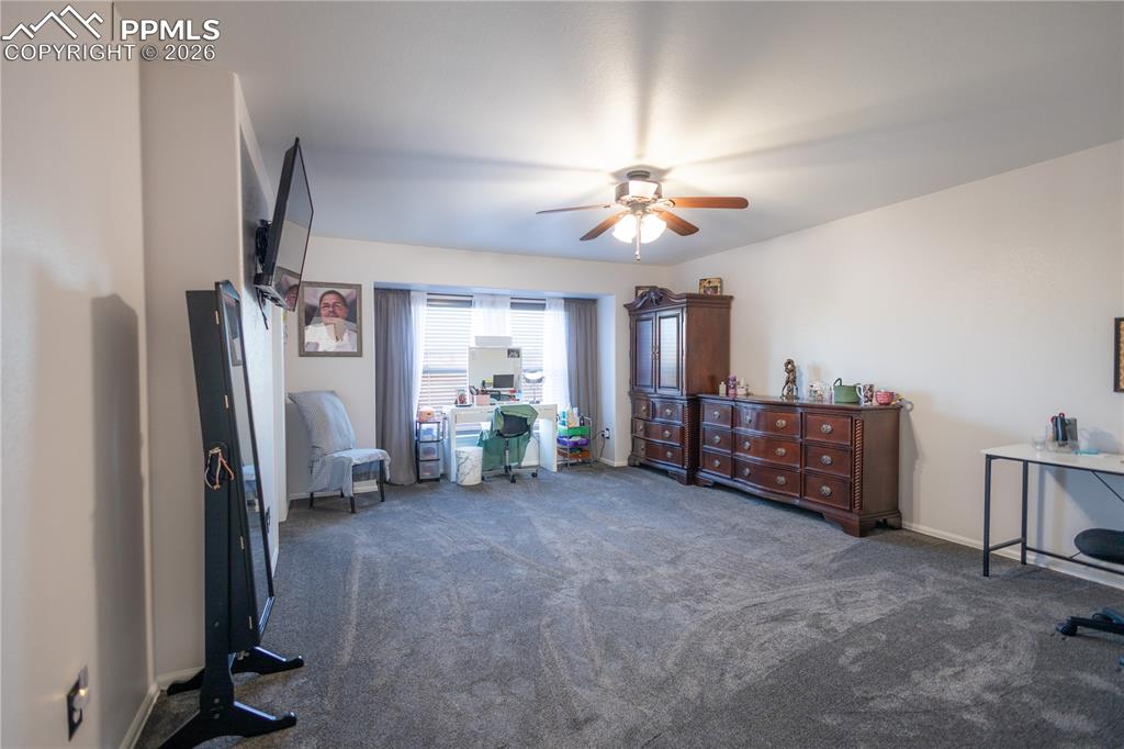 Bathroom featuring double vanity and light tile patterned floors