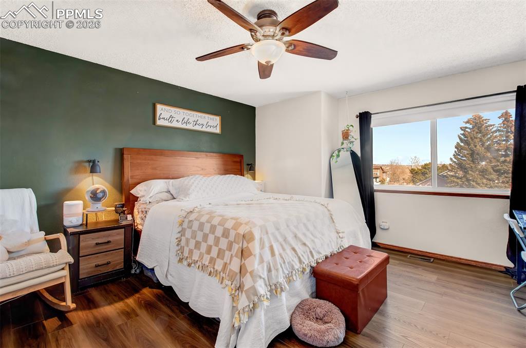 Upper level primary bedroom has great space and overlooks the front of the home 