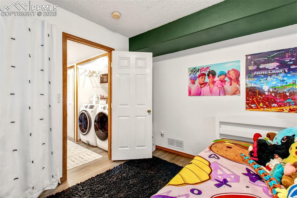 Lower level bedroom offers a seperate quiet living space for family, guest or a room to make your own