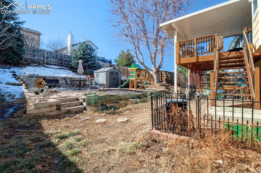 This backyard has different tier levels allowing it to be segmented into unique outdoor spaces