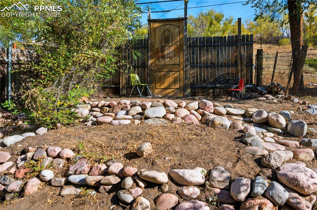 View of fenced backyard