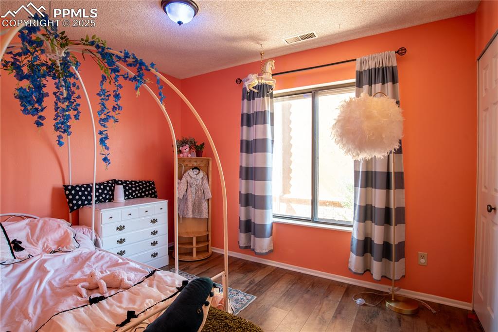 Bedroom with a large window