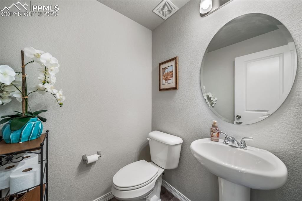 Built in storage and counter near the garage door is a great place to drop your keys and purse. 