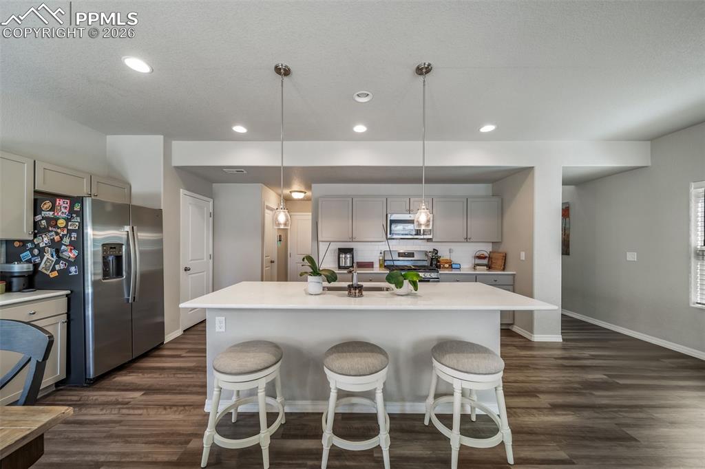 Full fenced yard with custom built Pergola covered patio. 