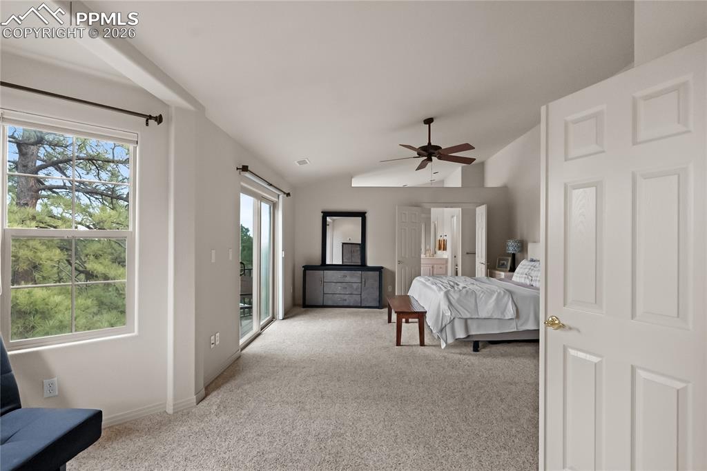 Primary bedroom with primary ensuite and balcony.