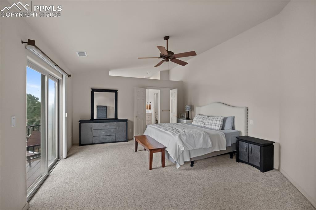 Primary bedroom with primary ensuite and balcony.