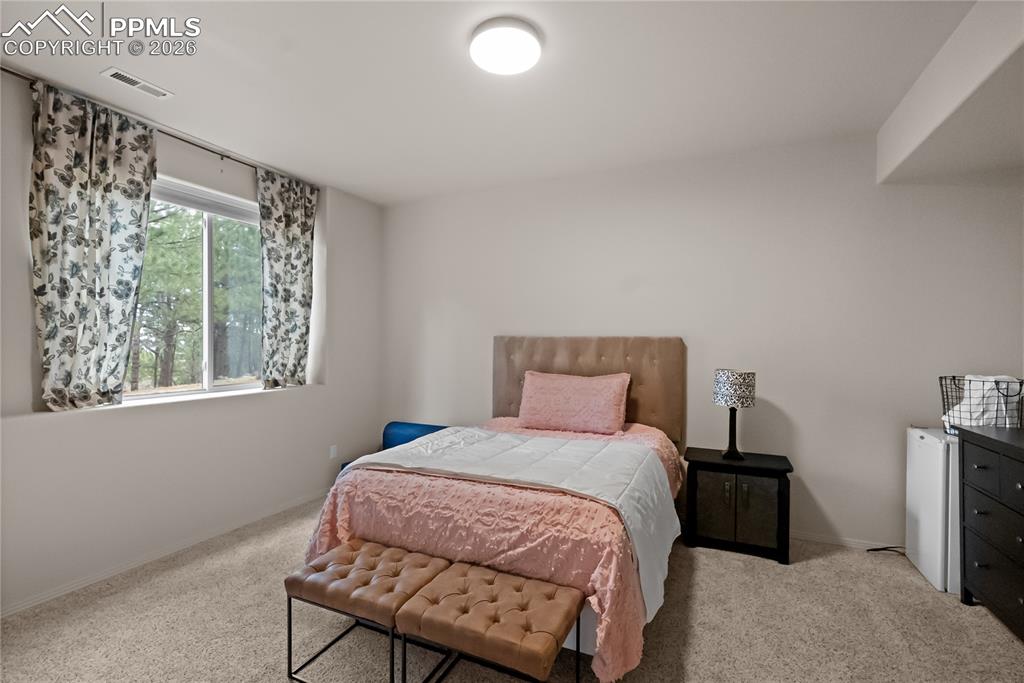 Basement, fourth bedroom with attached 3/4 bathroom.