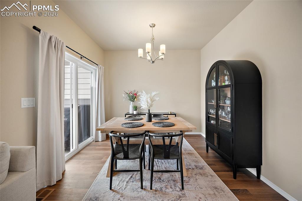 Dining space with doorway to extended outdoor living space