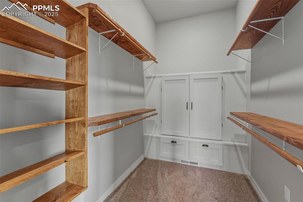 Primary Bedroom Walk in Closet.