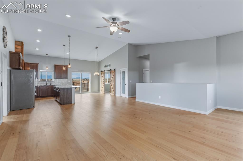 Check out these 13 ft ceilings and the amazing open concept floor plan.