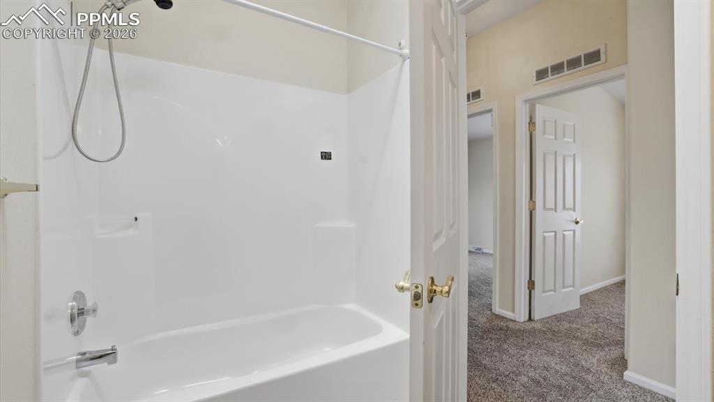 Tub/shower in the Full Bathroom.