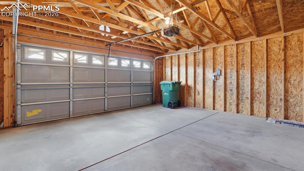 Two car attached garage with door opener.