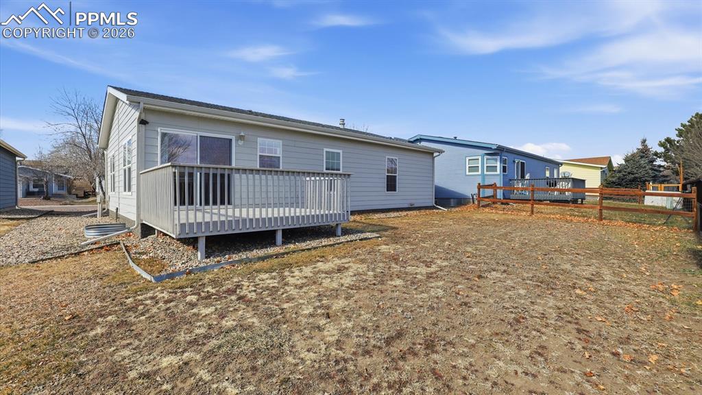 Spacious, level backyard for the kids and pets to play and have fun.