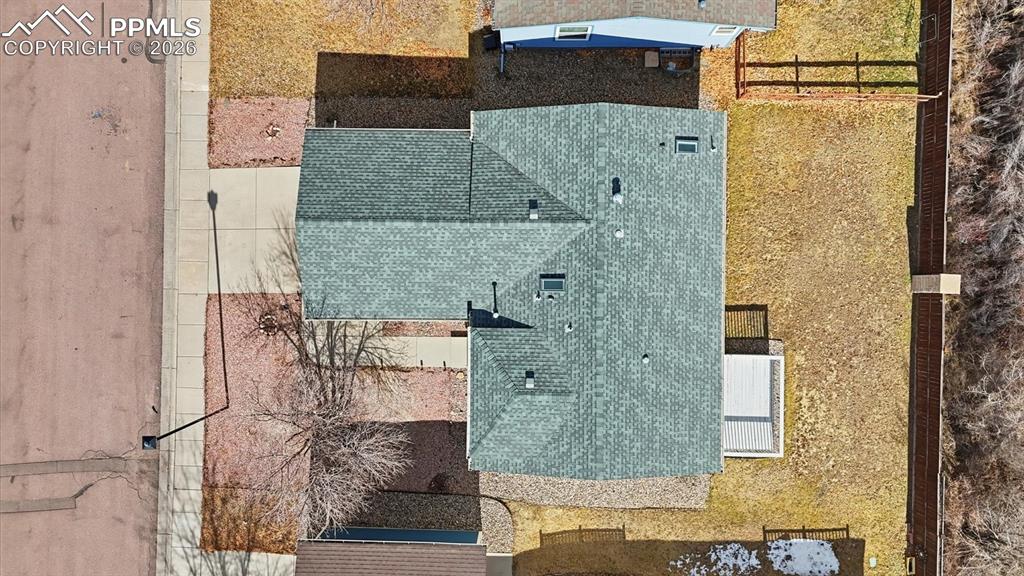 Aerial view of home and lot.