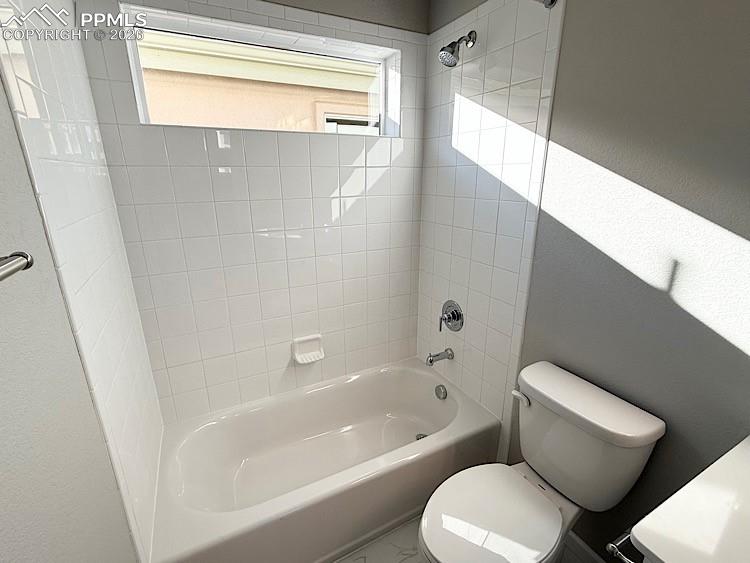 Hall Bathroom with Quartz Countertop and Tile Surrounds! Located on the upper level!