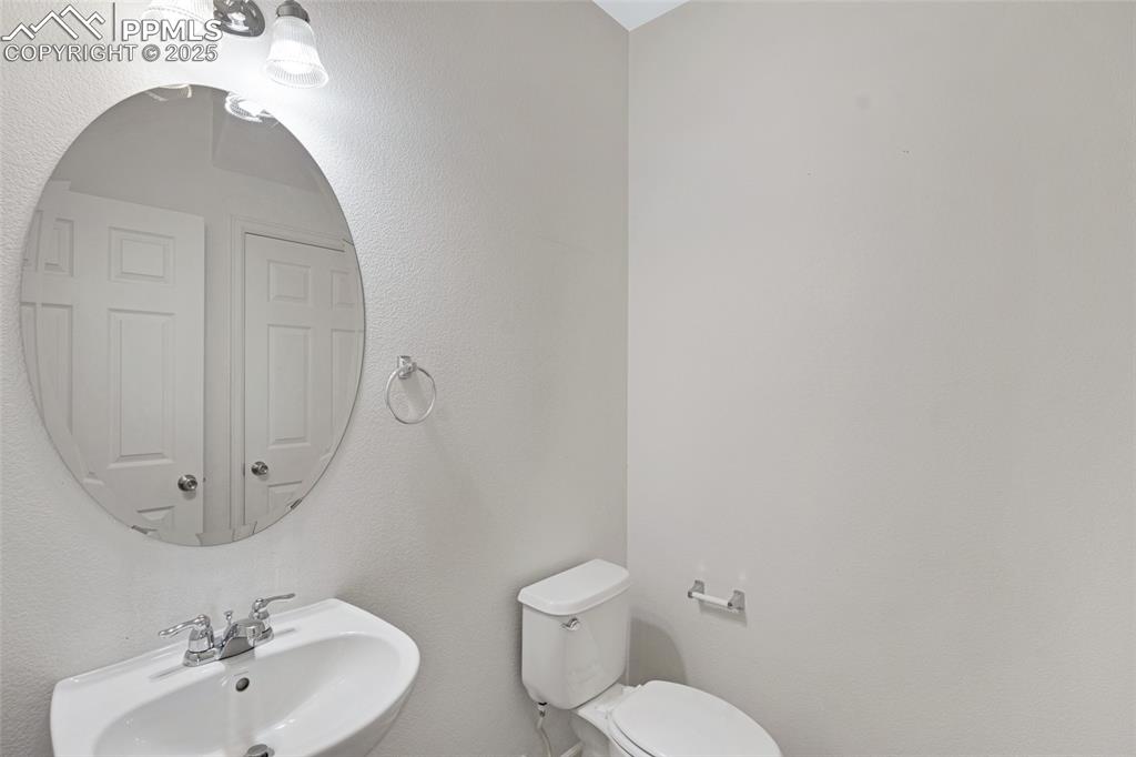 Bathroom with a sink and toilet