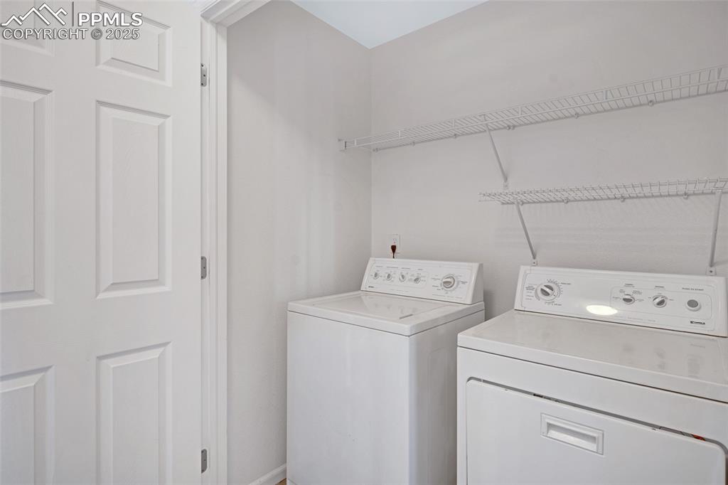 Washroom featuring independent washer and dryer