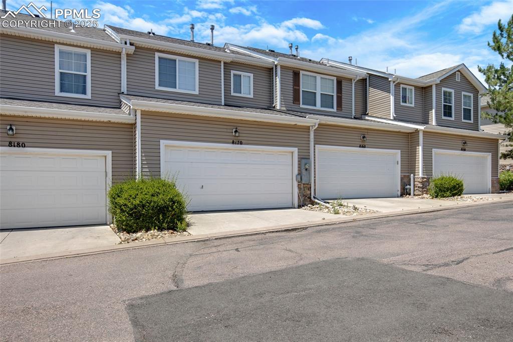 Multi unit property featuring a garage