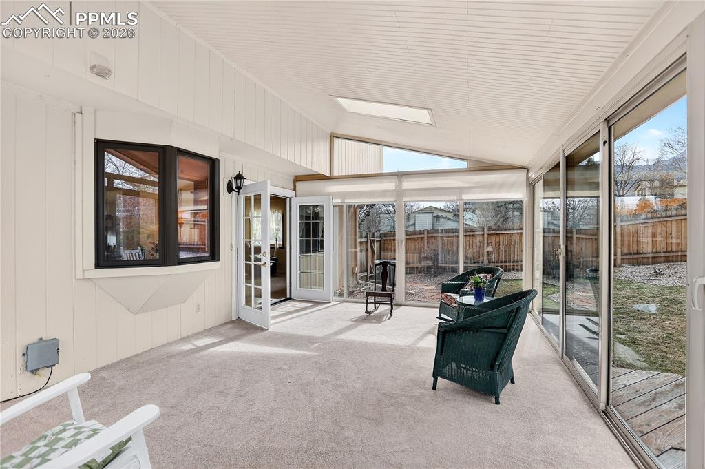 Beautiful 3-season sunroom! Notice the french doors which both open!