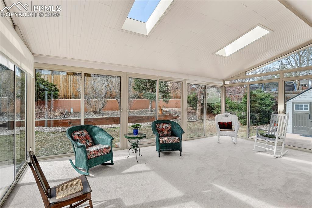 Full length glass panels will make you feel like you are outside! The skylights add to the natural light.