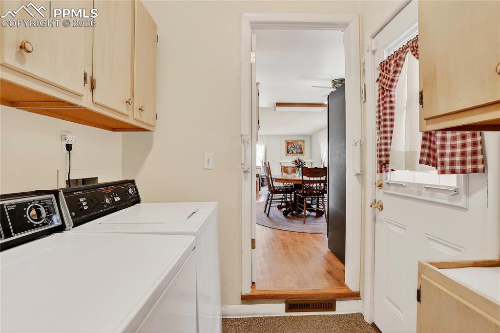 Main floor laundry. Door on the right leads to the patio with Sunsetter awning!