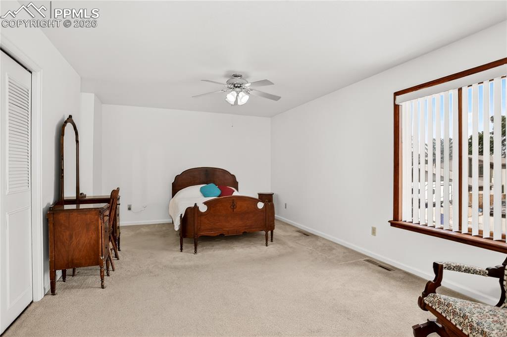 Another view of primary bedroom.