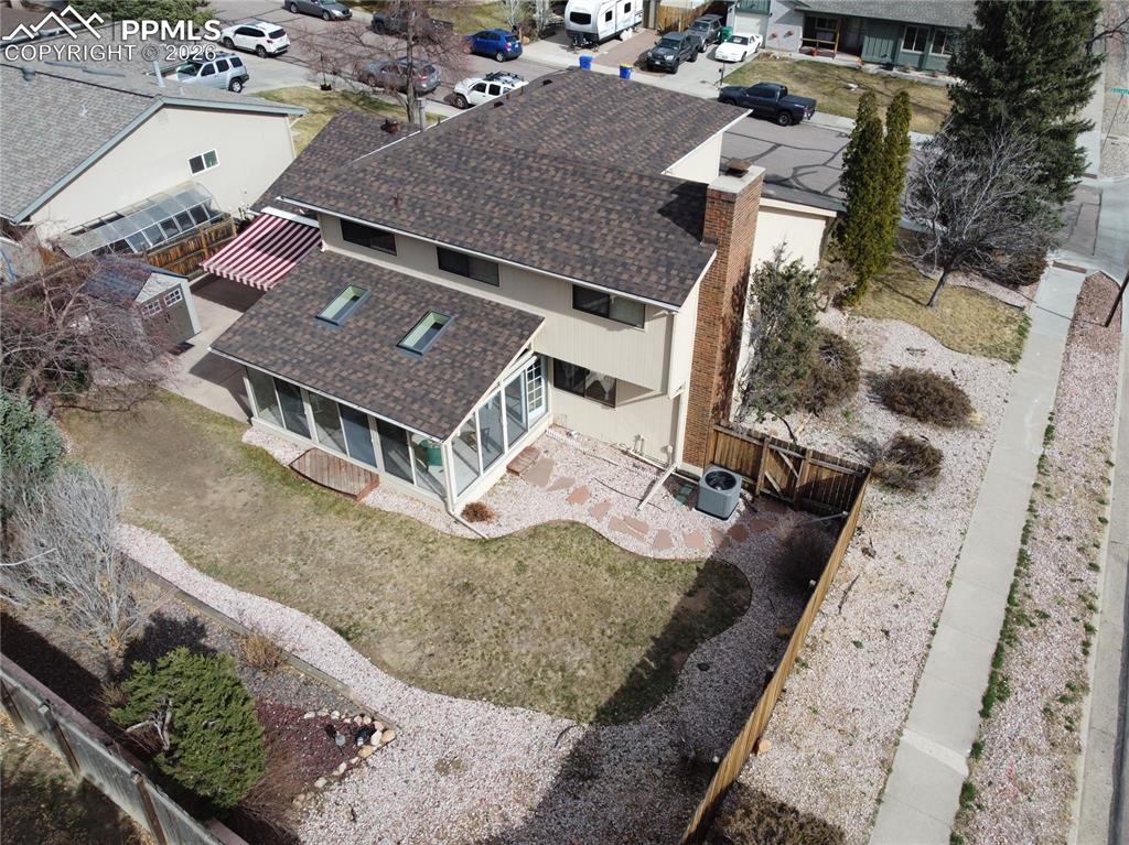 You can see the large sunroom with full glass panels ... and the Sunsetter awning!