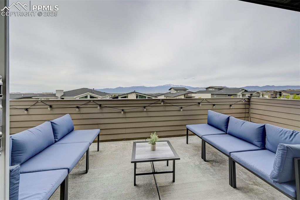 Fenced backyard with outdoor lounge area and a patio area