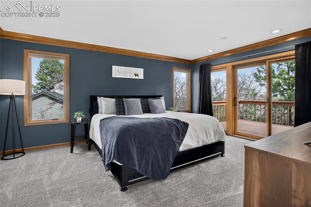 Main-level primary suite w/ walk-out