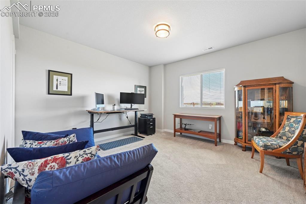4th Bedroom - Office space with light colored carpet and baseboards