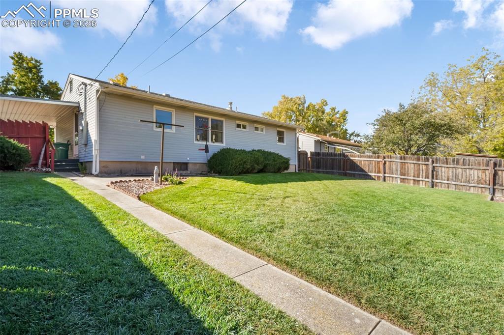 Backyard view of home