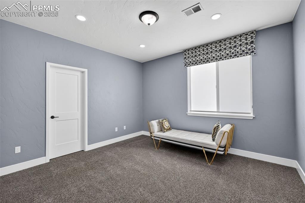 upper level bedroom with walk in closet