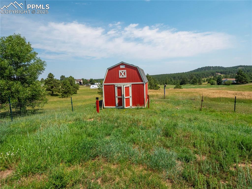 View of shed with a view of rural / pastoral area