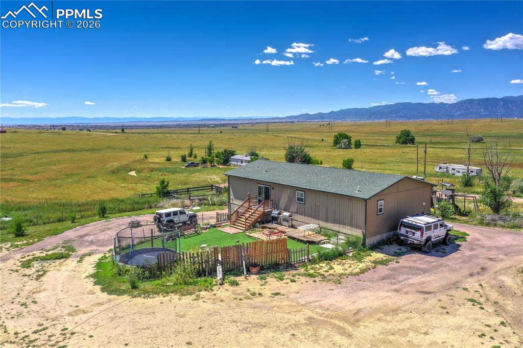 Horse-ready property with secure fencing and expansive acreage for grazing, training, and equestrian activities