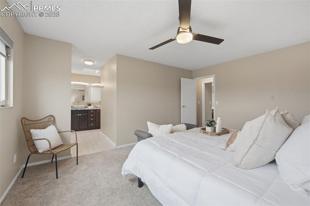 Primary bedroom facing en suite bath 