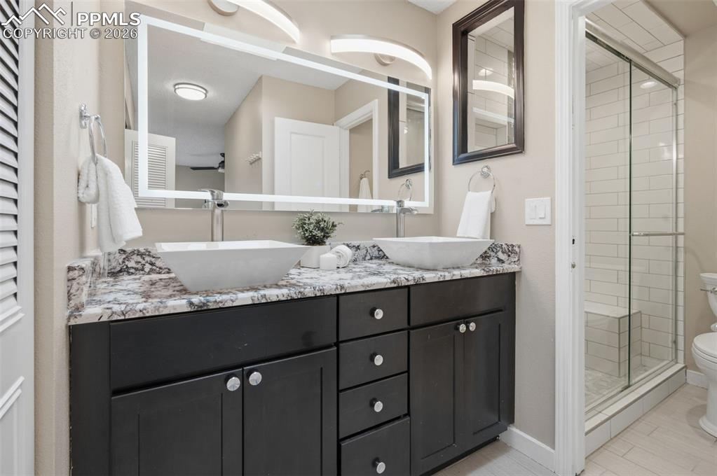 Primary bathroom vanity and shower
