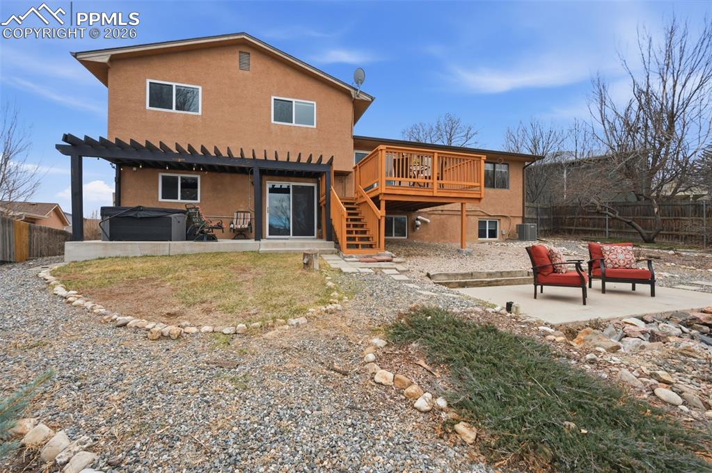 Backyard wide view of house