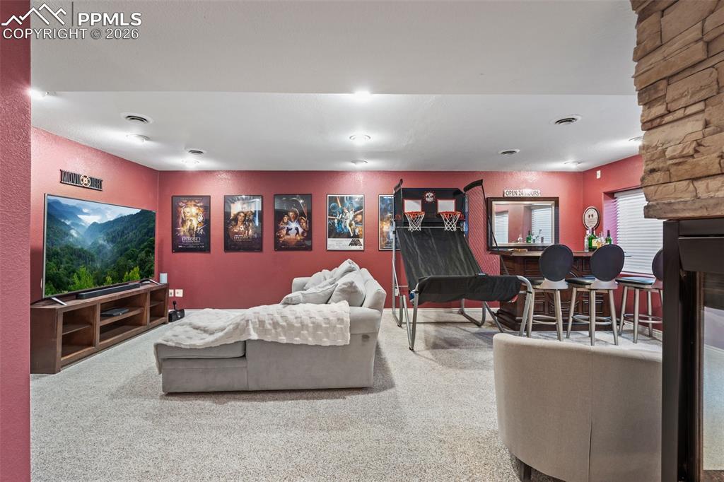 Living area with carpet floors