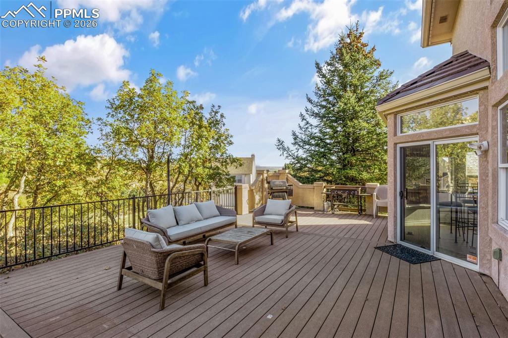 Wooden terrace with an outdoor living space