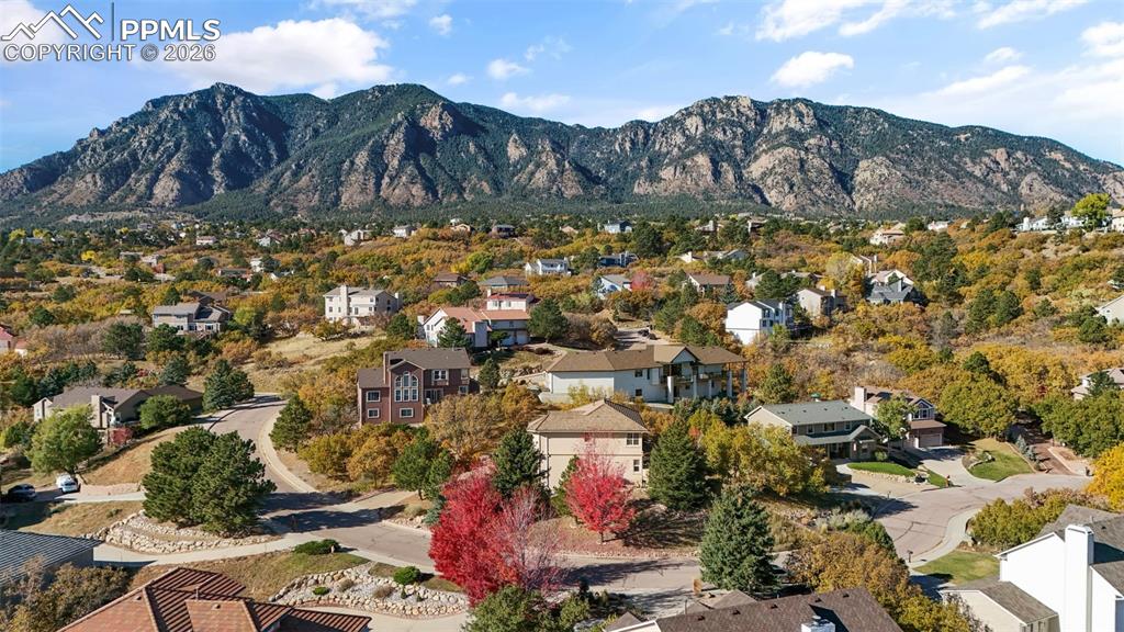 Aerial view of residential area with mountains