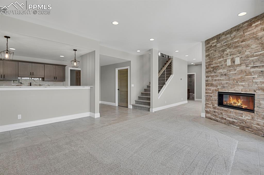 view of family room and wet bar from patio door