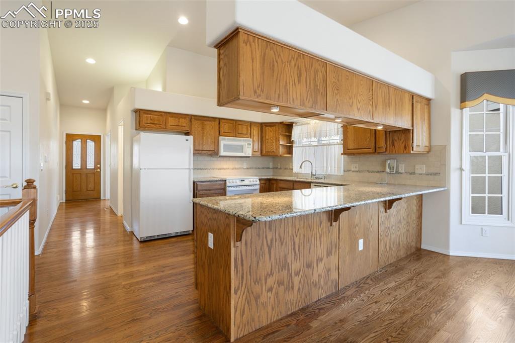 Generously Sized Kitchen with Sprawling Granite Counter Tops!