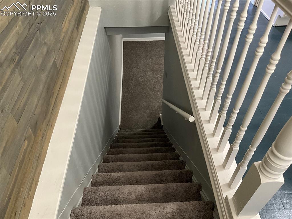 View of stairway w/ new carpeting 