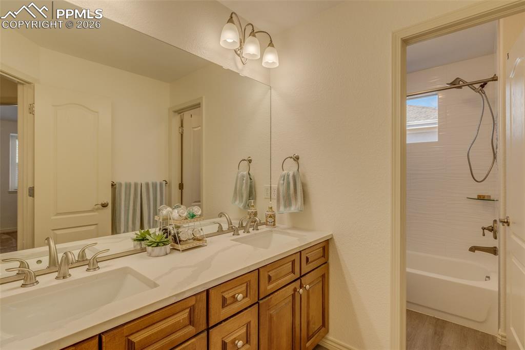 Upper level bath with dual sinks
